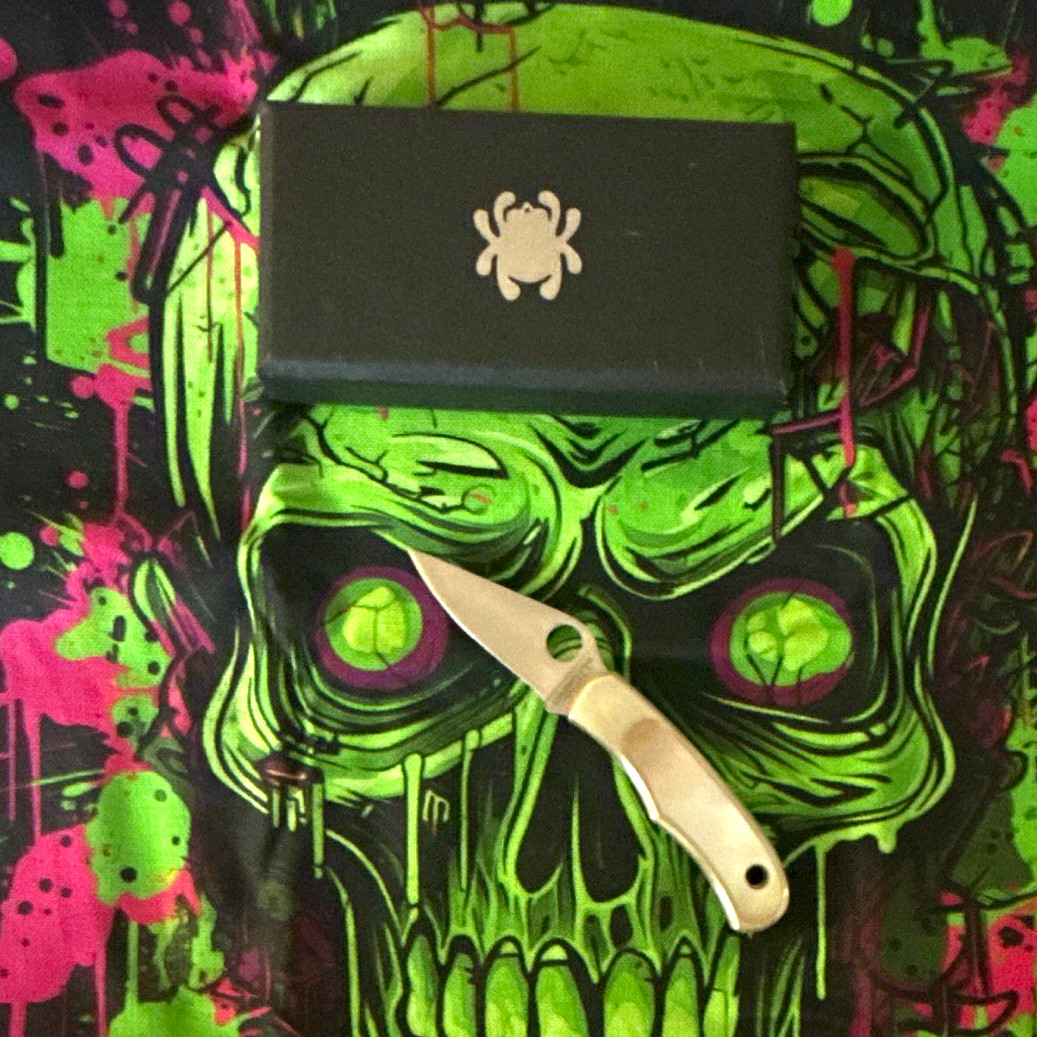 Spyderco Bug - 12C27 Sandvik Steel Blade Nickel/Abalone Handle