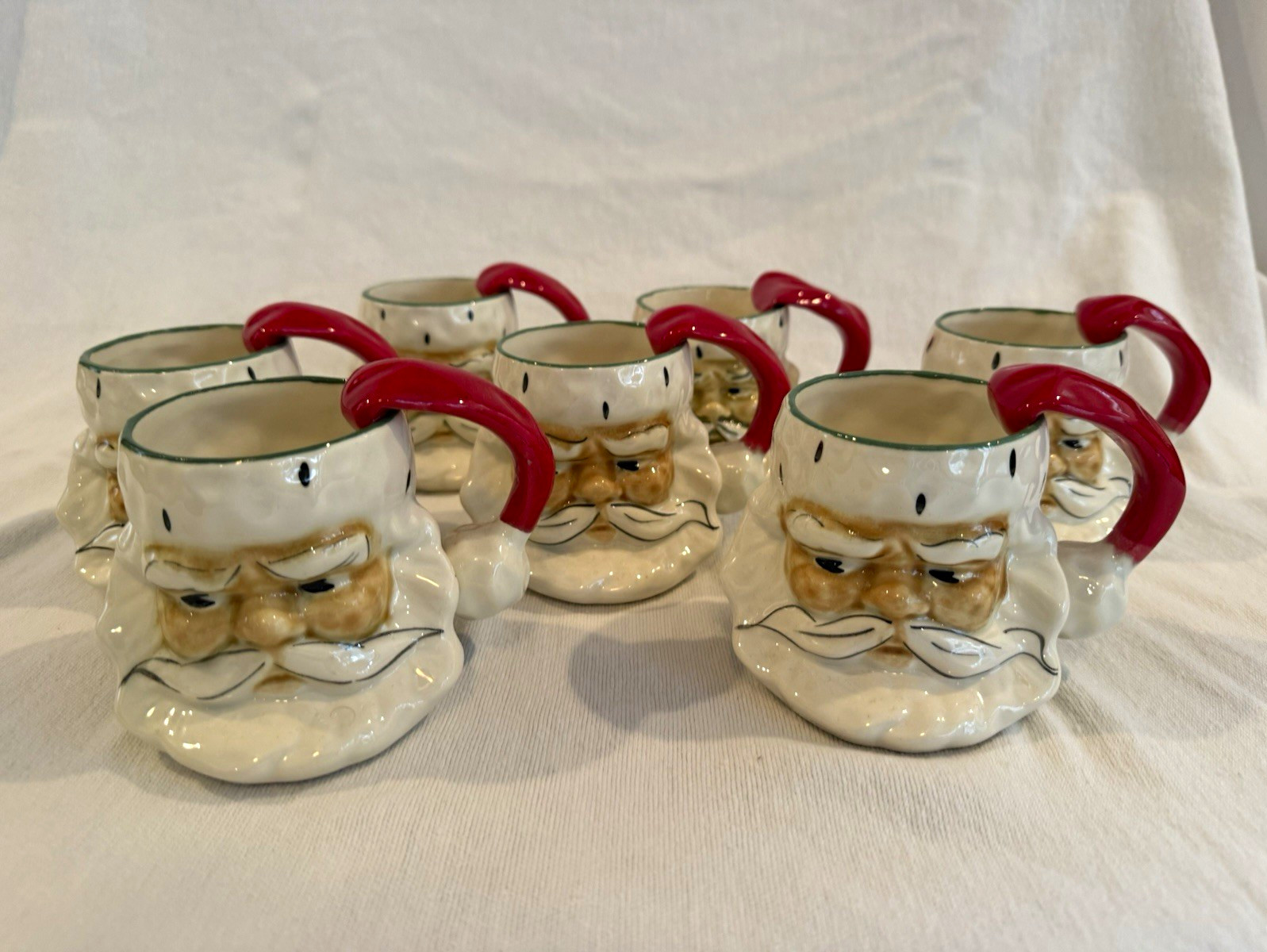 Vintage 1951 Riddell Pottery Santa Claus Face Mugs Painted Ceramic Set of 7