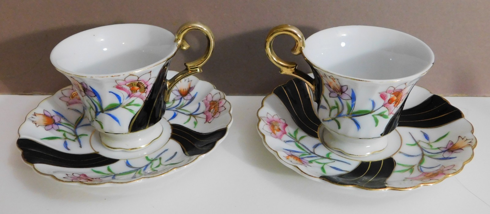 VINTAGE MERIT CHINA JAPAN DEMITASSE PAIR CUP SAUCER BLACK PINK GOLD FLOWERS