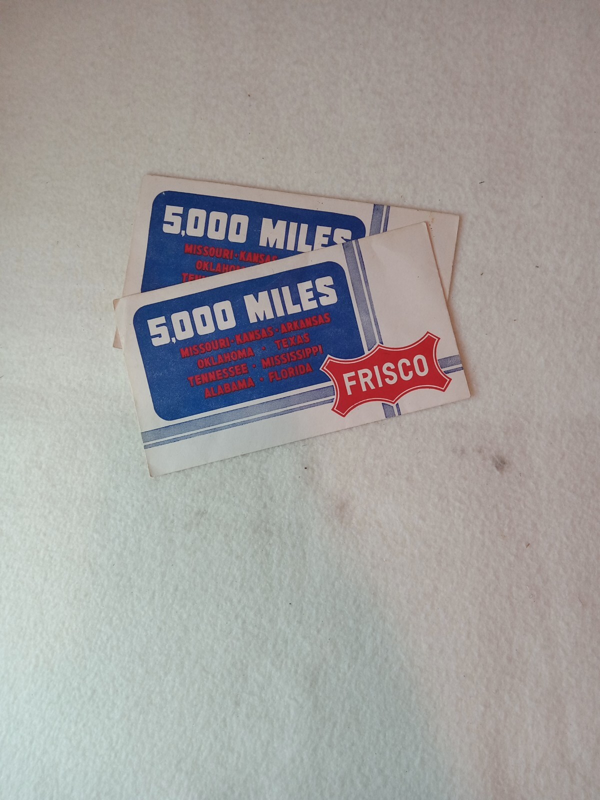 Two (2)  Frisco line, 5000 mile insurance policy envelope, for 25 cents