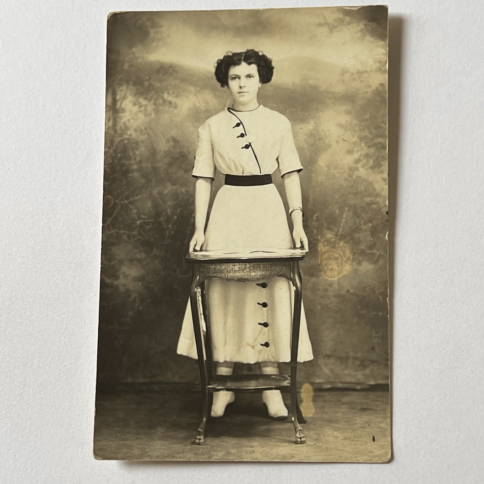 Antique RPPC Real Postcard Photograph Young Woman Footed Table Odd Unique Dress