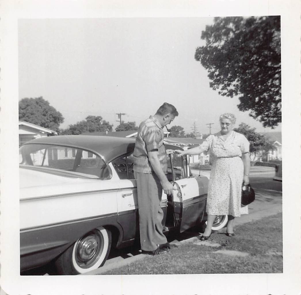 1958 Chevrolet Biscayne Four Door 1950s Photo Man Woman Profile Two Tone Chrome