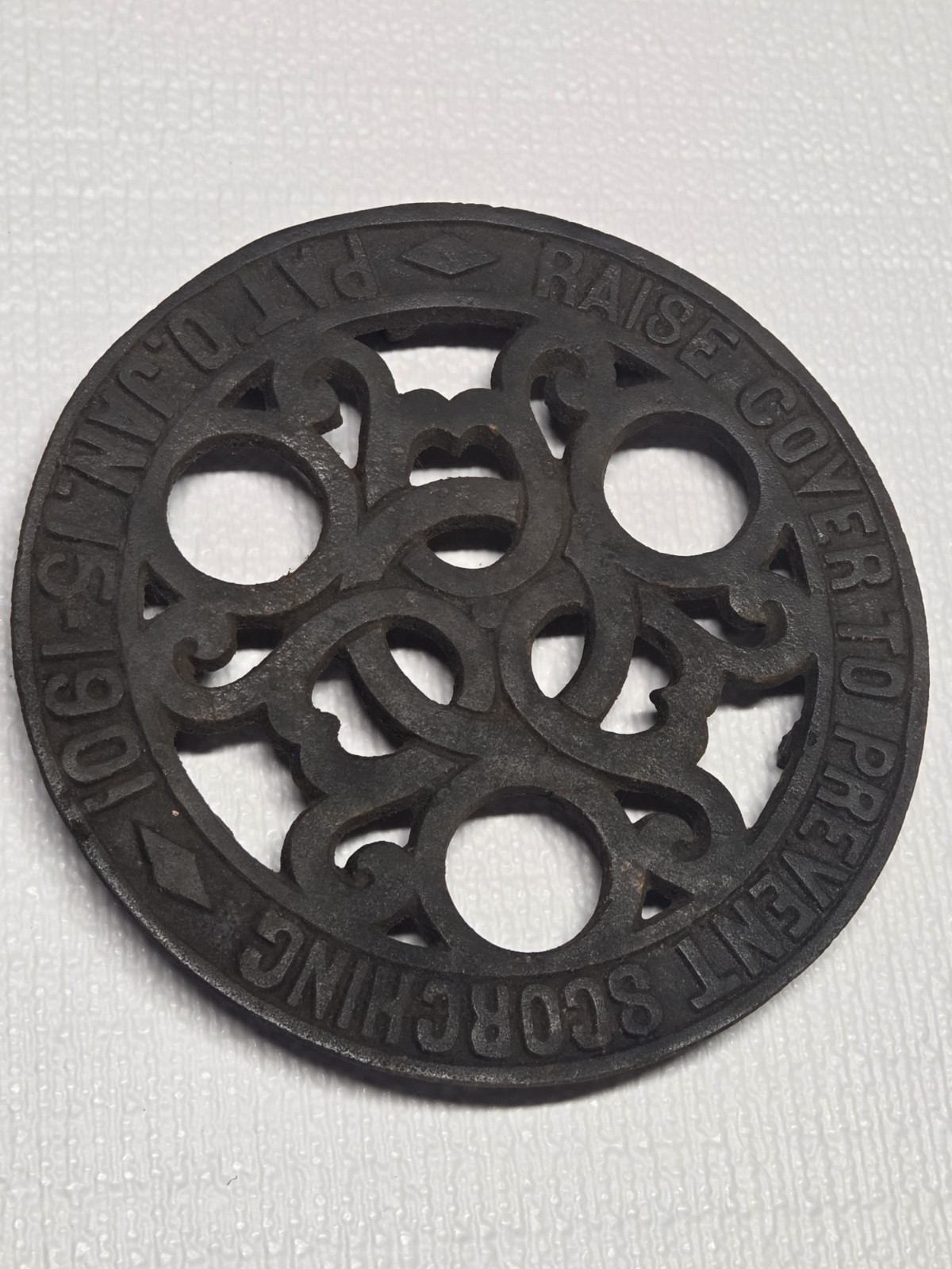 Vintage Cast Iron Round Trivet Hot Plate, Raised Feet, 6 in, 