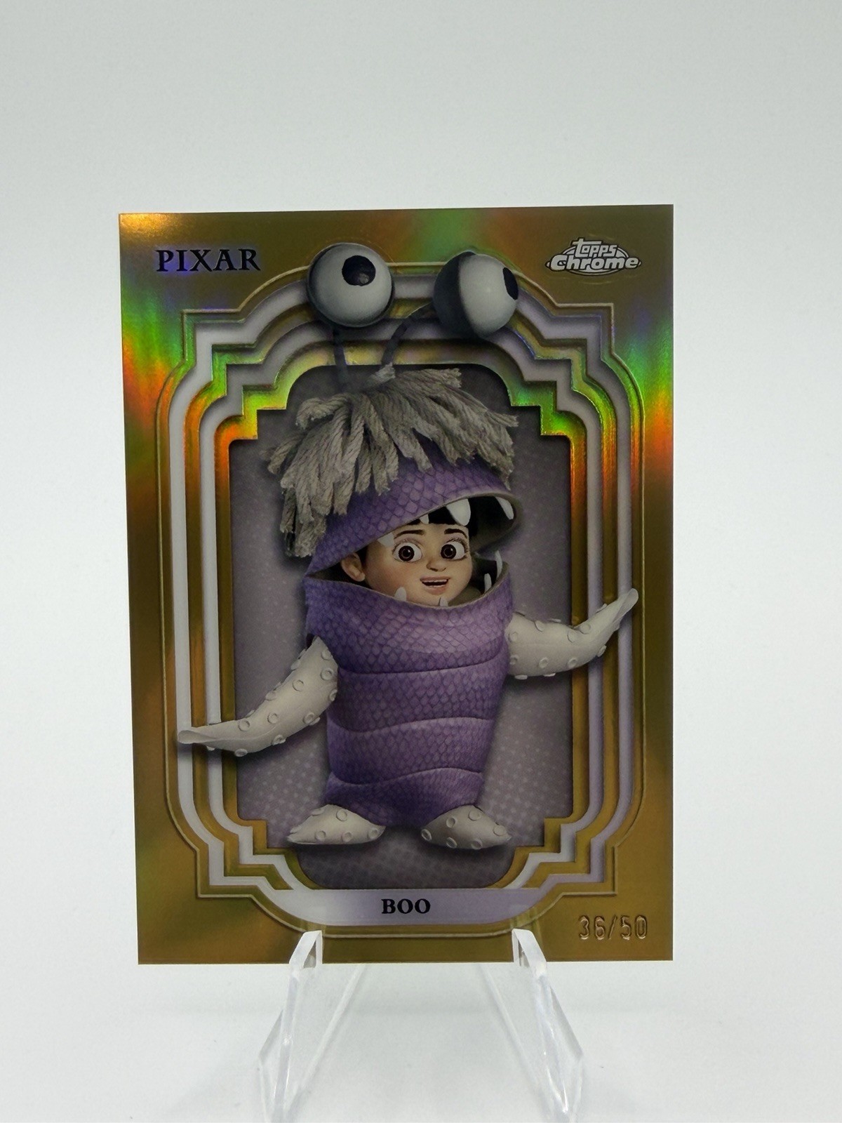 2024 Topps Chrome Disney #88 Boo Gold Refractor #/50 - Monsters Inc.