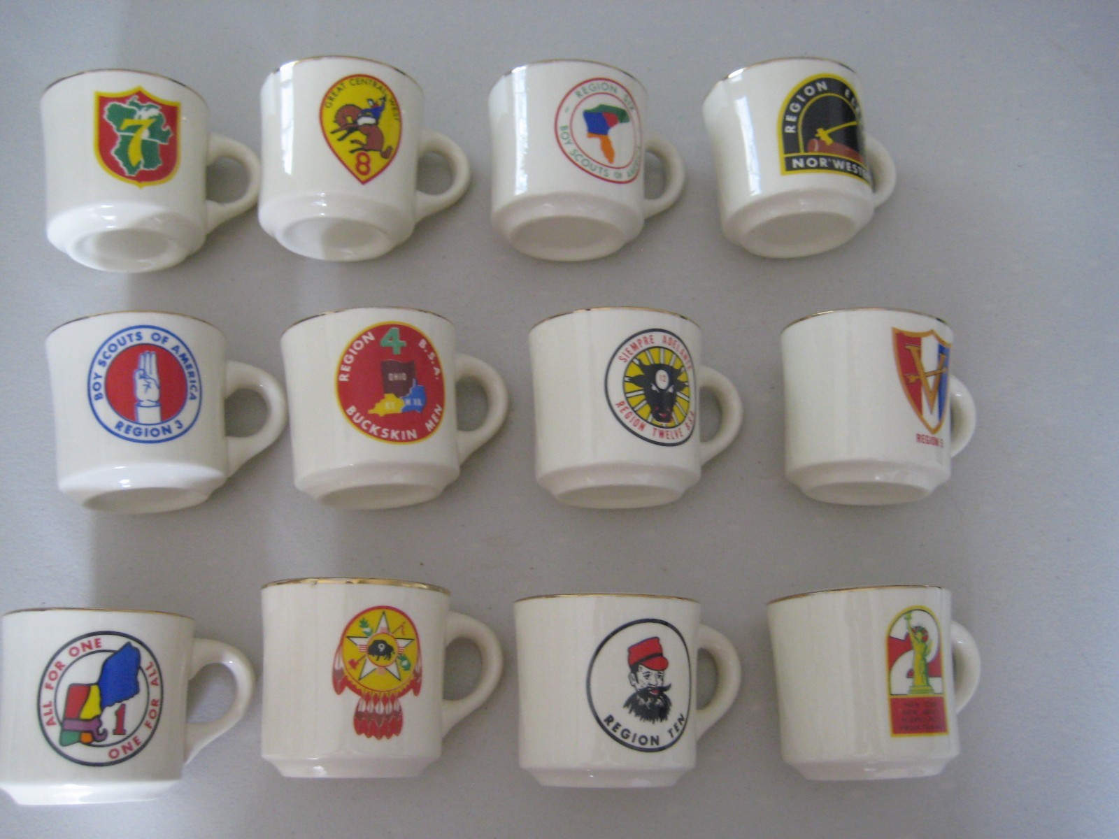 COMPLETE VINTAGE SET OF 12 REGION MUGS