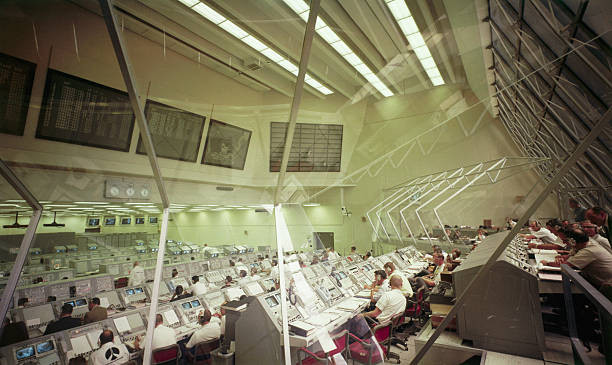 The Launch Control Center Firing Room 3 bustles activity during Ma- Old Photo