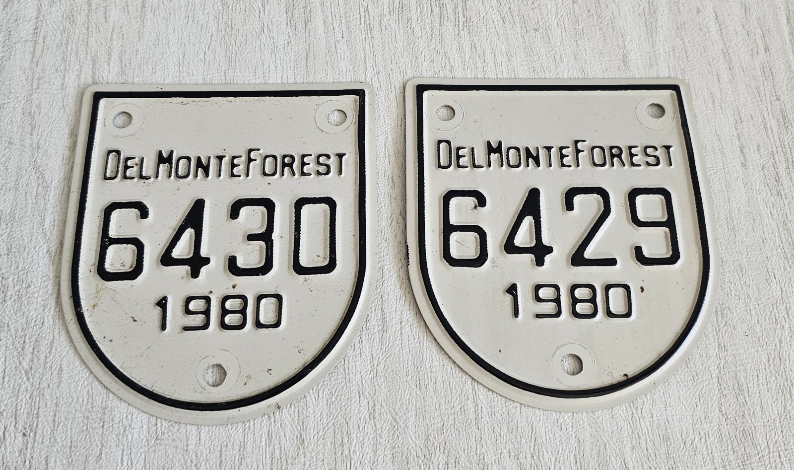 2- 1980 Del Monte Forest PEBBLE BEACH CALIFORNIA #6429-30 CAR LICENSE GATE BADGE