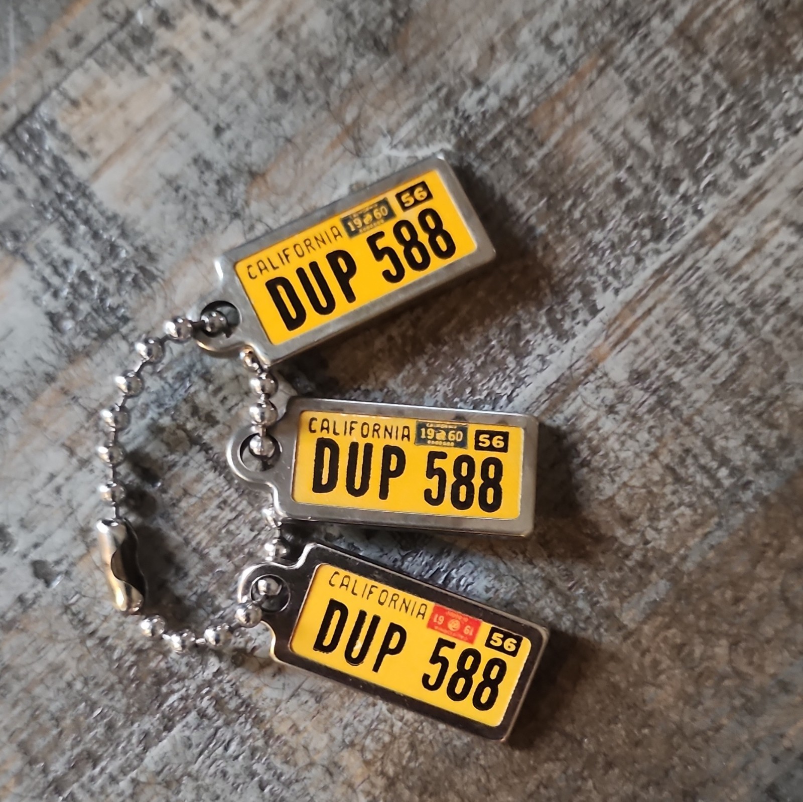 NOS Vintage 1956 California Mini License Plate Keychain Set of 3 DUP 588