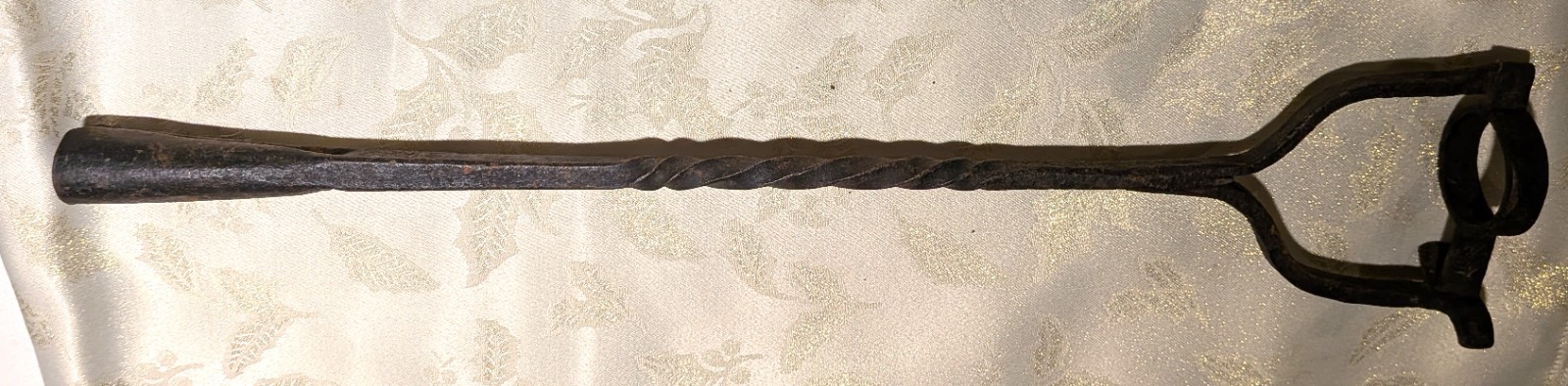 Antique hand-forged branding iron, likely used for marking livestock