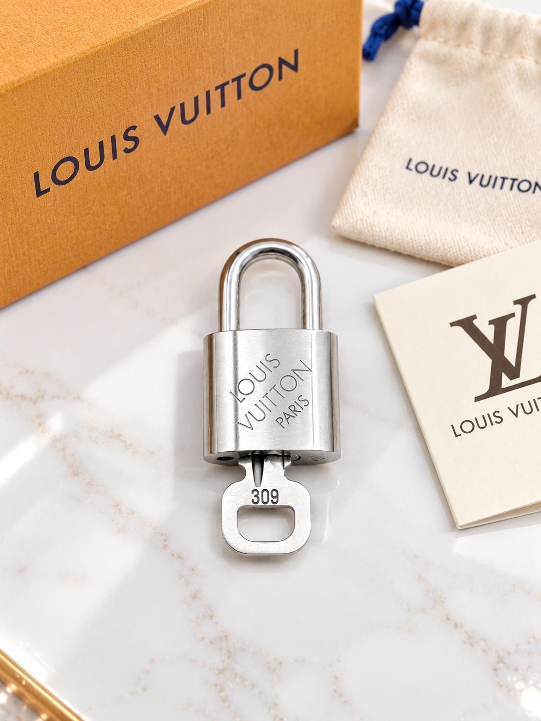 Authentic Louis Vuitton Silver Padlock & Key Set #309