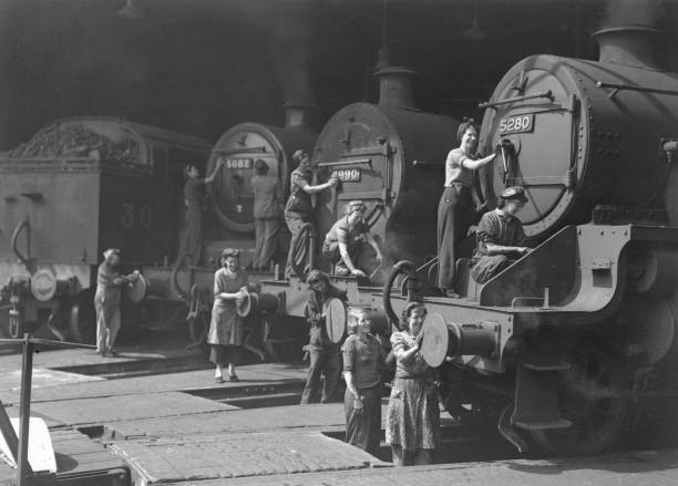 Group of women volunteers cleaning sulphur deposits from LMS steam- Old Photo