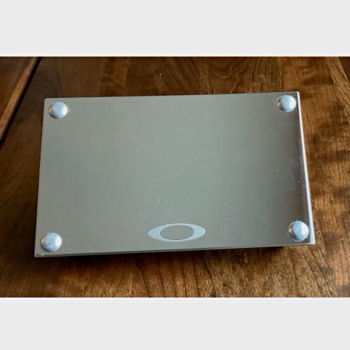 Original Oakley Silver sunglass display mirror brand new in box I have a bunch