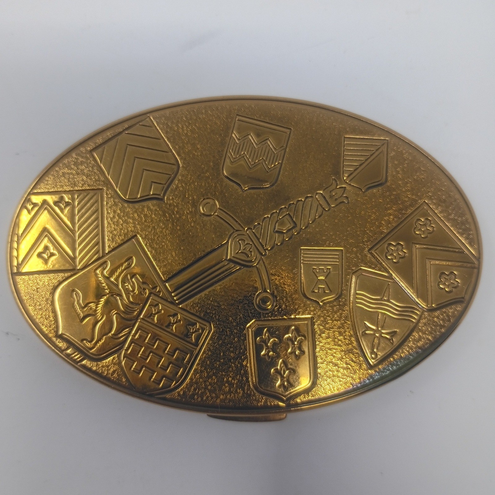 Vintage American Beauty Oval Gold Toned Medieval Sword Makeup Powder Compact