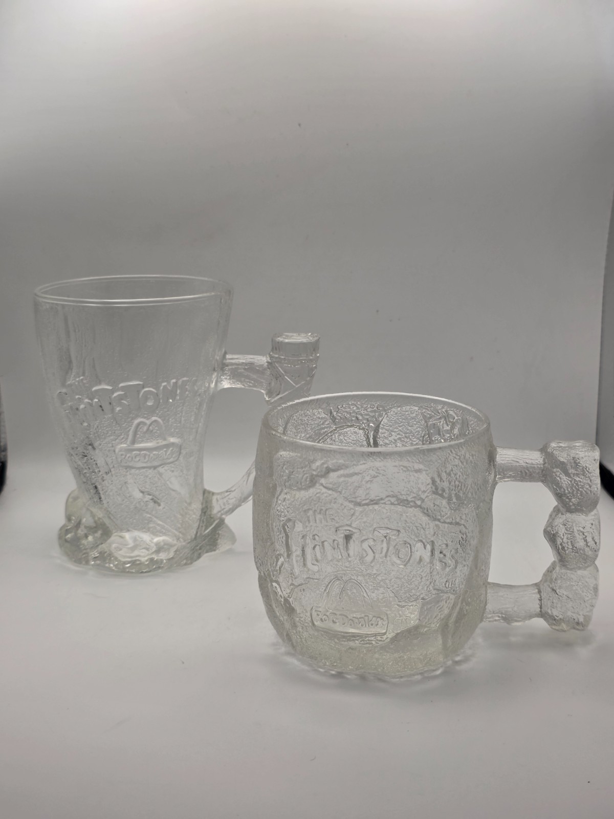 Vintage 1993 McDonalds Flintstones Glass Mugs Set of 2 Mammoth & Rocky Road Mugs