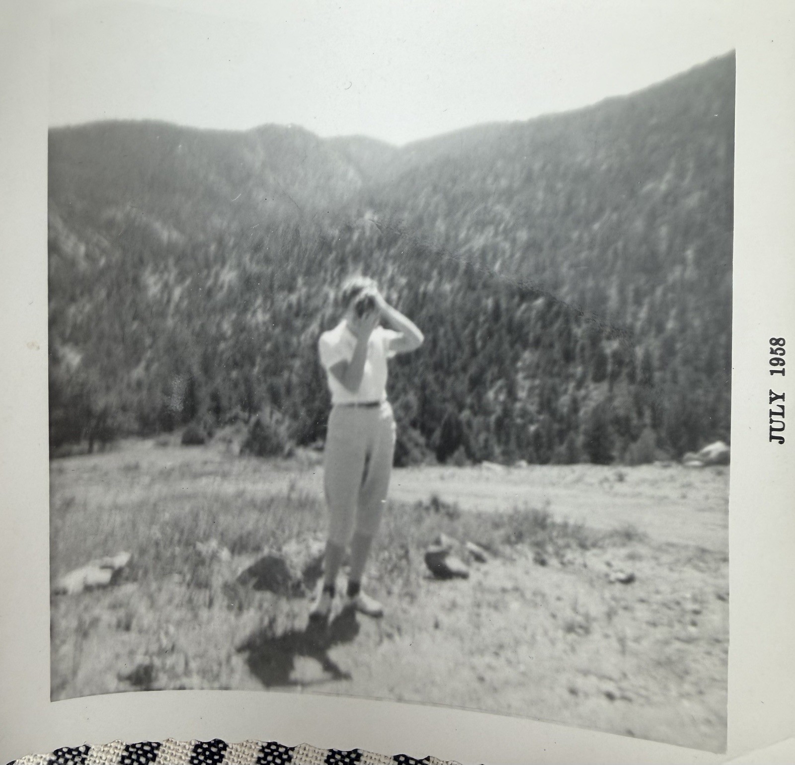 Vintage 1958 Snapshot Photo Woman Mountain Holding Camera Photographer Western