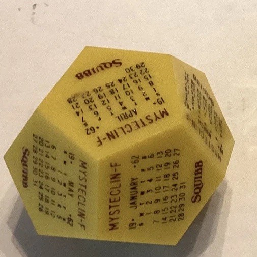 Vintage 1962 Squibb Pharmaceutical Advertising Desk Calendar 12Sided Paperweight