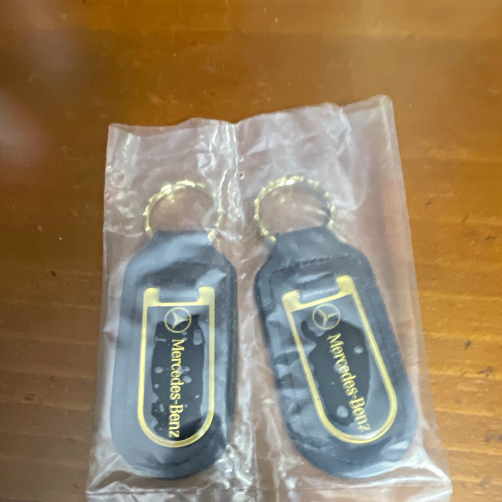 Mercedes-Benz Black Keychain Gold Trim Pair (2x) 2024