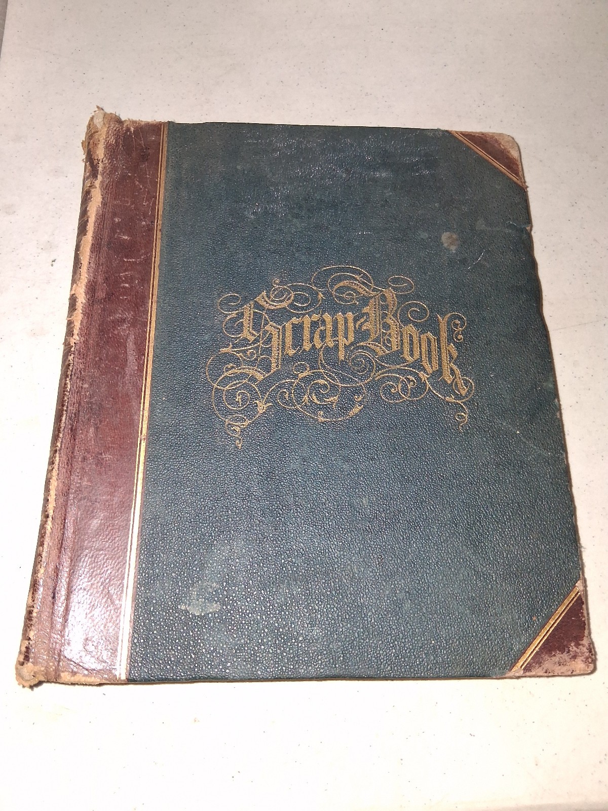Antique Scrapbook of Late 1800s with newspaper clippings.