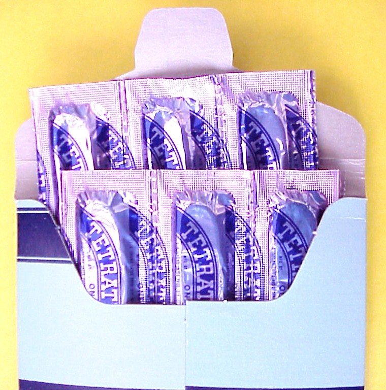 NOS VINTAGE TETRATEX, CONDOMS / RUBBERS, FULL FOLDER OF 12 PINK FOIL RUBBERS