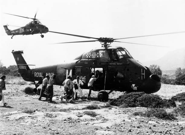 Royal Navy Wessex helicopter 845 NAS picking up evacuees near - 1974 Old Photo