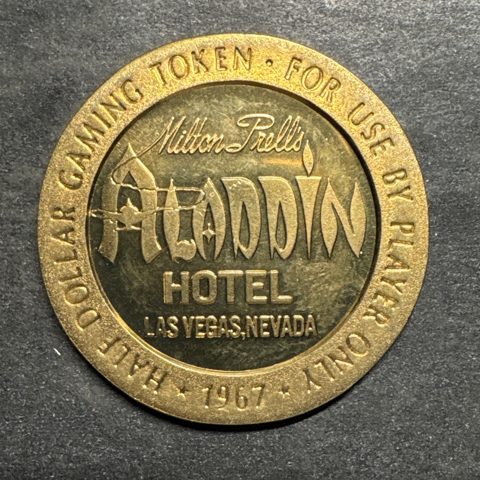 ALADDIN HOTEL CASINO LAS VEGAS NEVADA 50 CENT GAMING TOKEN 1967 Proof Ultra Rare