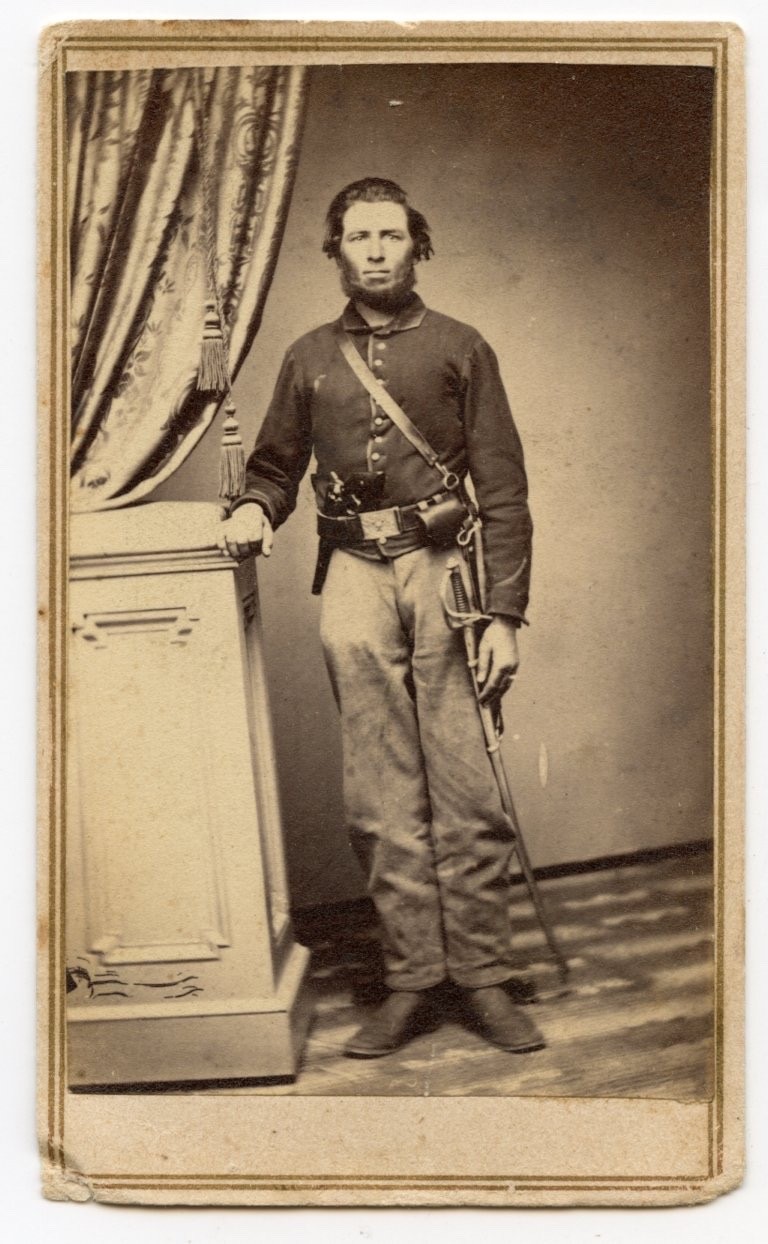 Civil War CDV of a heavily armed Union cavalryman, no backmark
