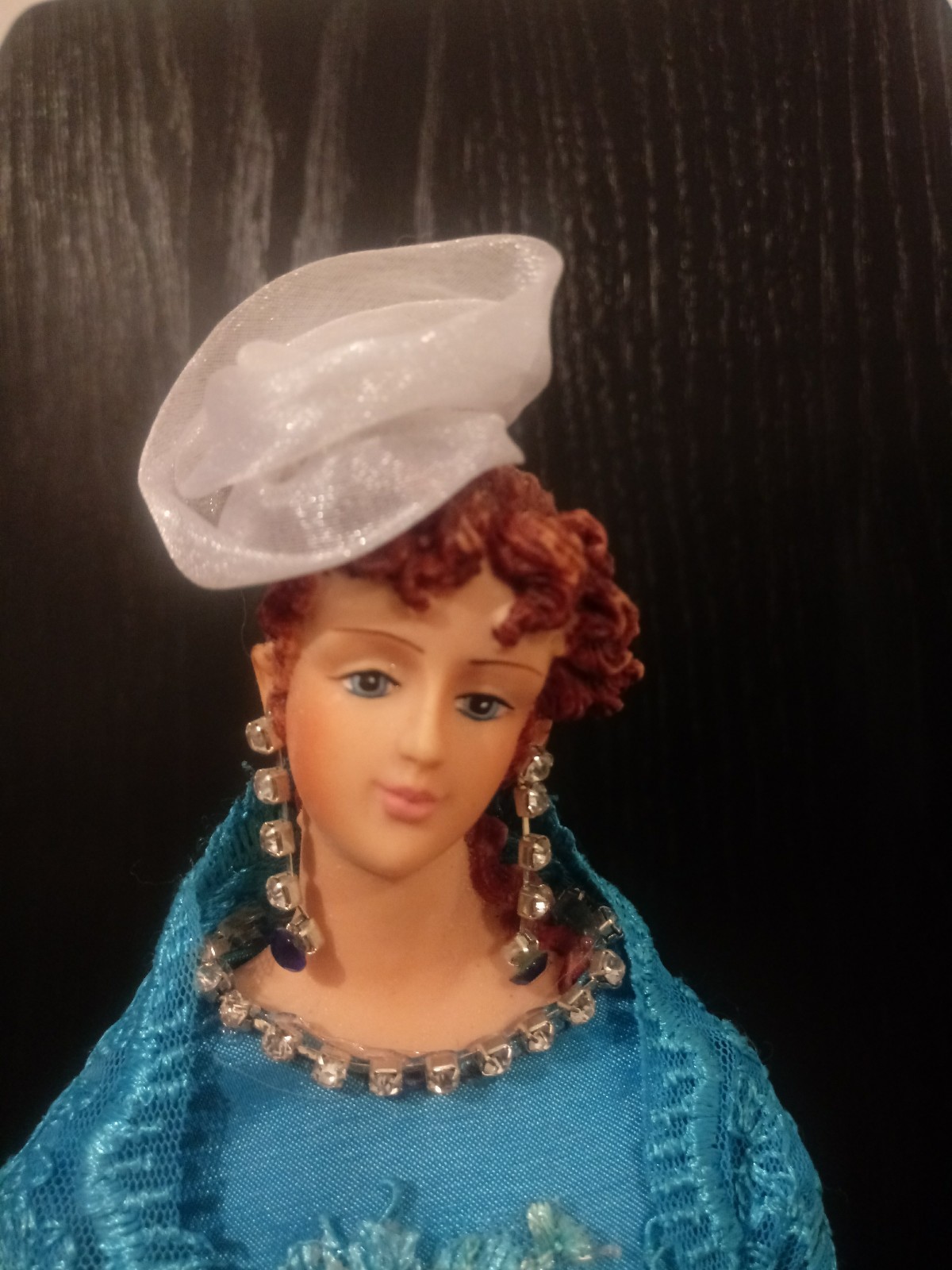 Antique Lady Porcelain face Doll with wood base & jewlery 