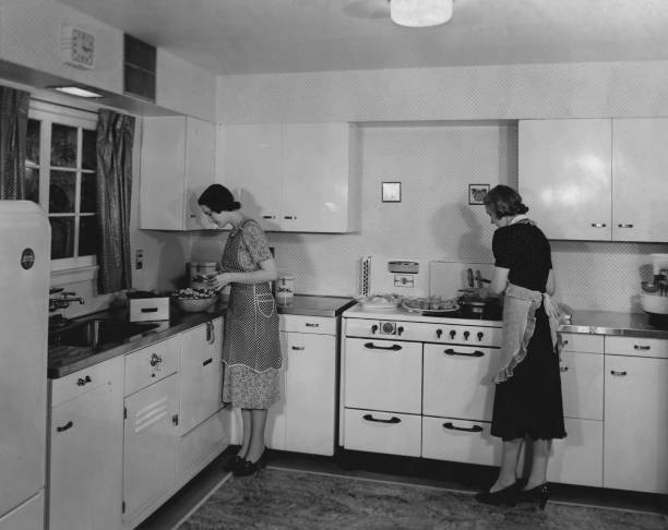 Two women making dinner in the 1940\'s Historic Old Photo
