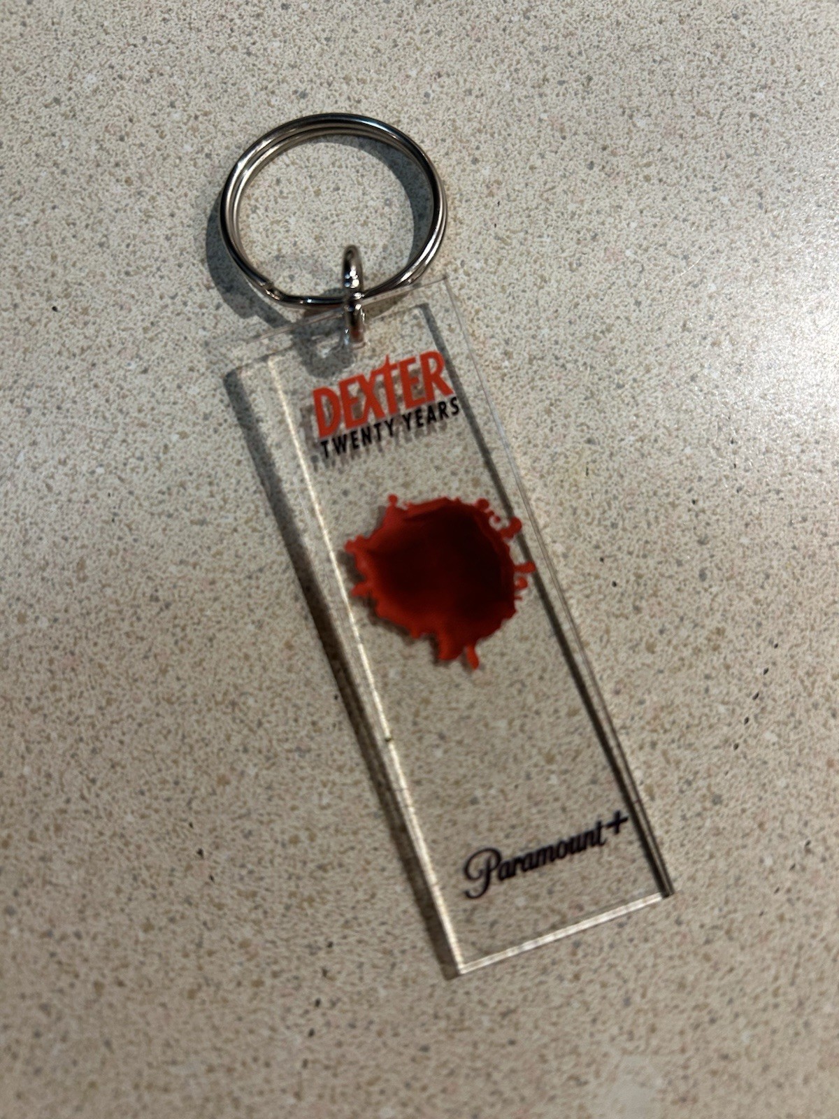 Dexter Resurrection Blood Slide Keychain NYCC 2026 Comic Con Paramount +