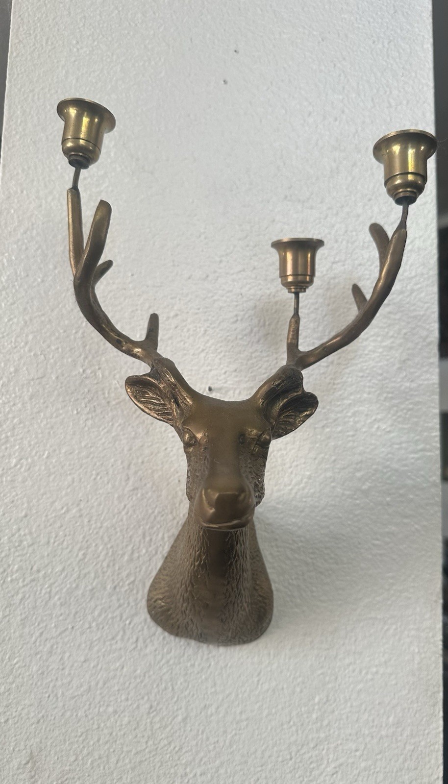 Stellar bronze deer-design wall sconce for candles