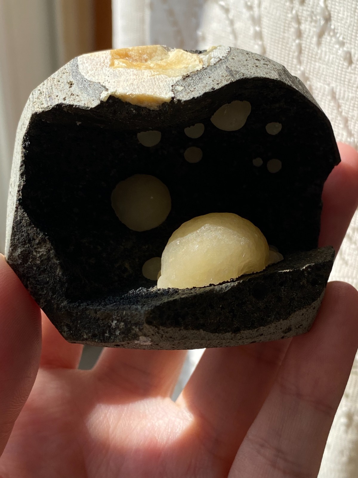 Rare Natural Spherical Calcite Specimen on Vesicular Basalt Matrix, Zhejiang