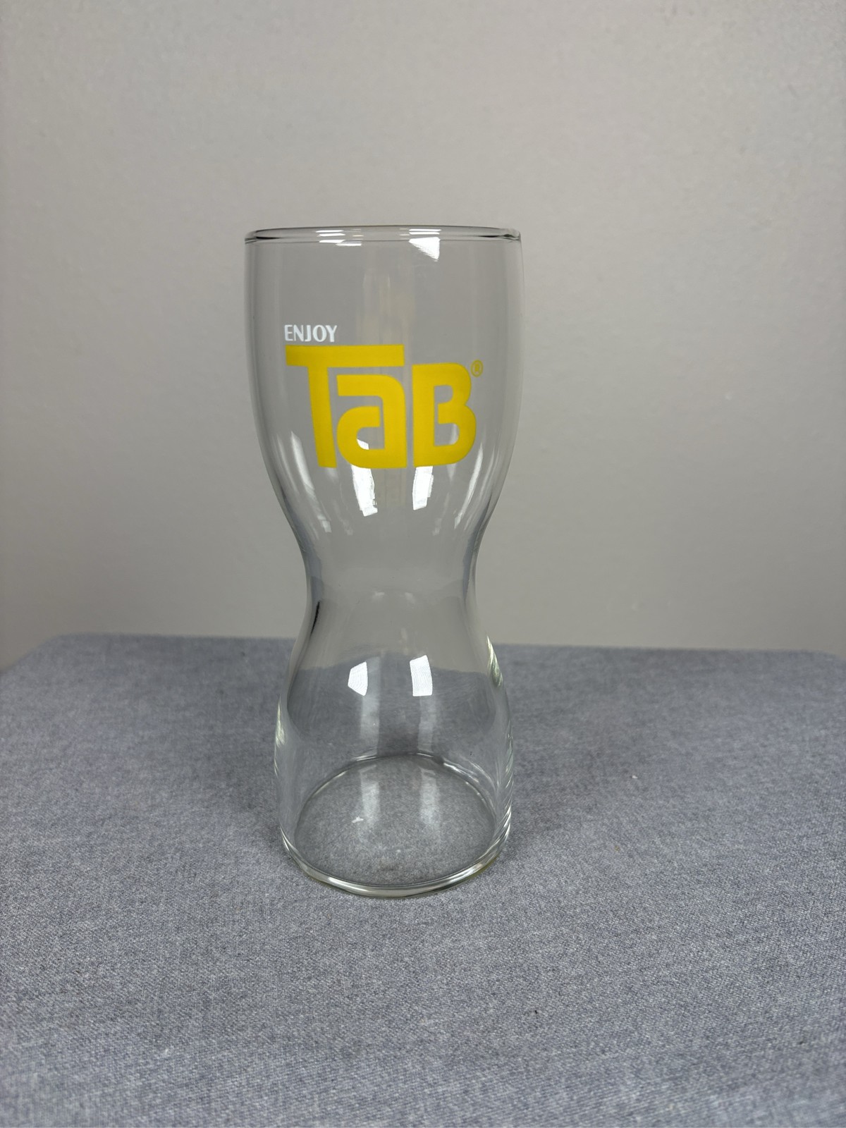 Vintage Enjoy TAB Soda Drinking Glass Hourglass Shape 7 Inch Tall Yellow Logo