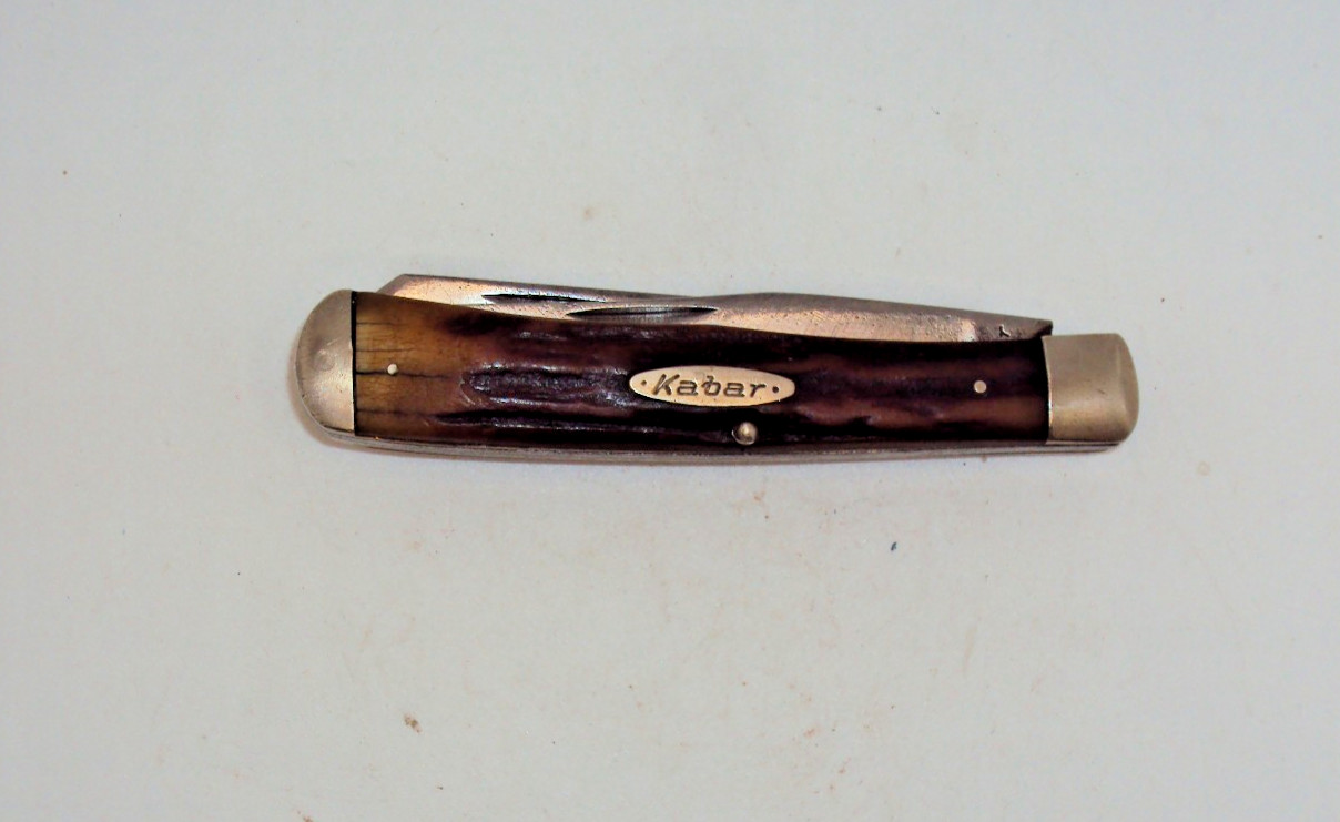 Vintage Kabar bone handle pocket knife used with ware good snap