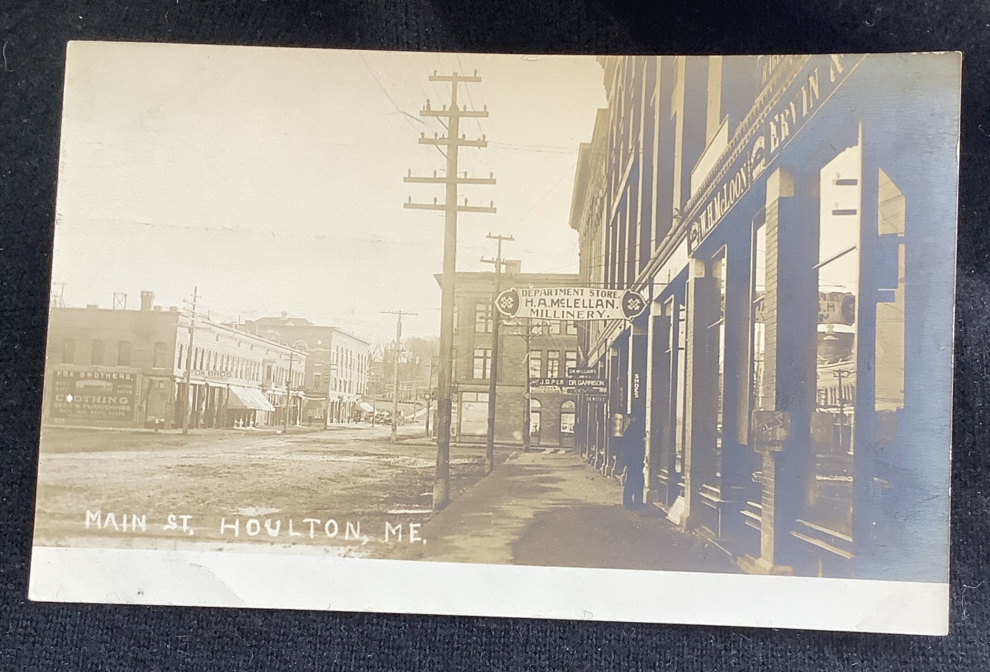 HOULTON, ME MAIN STREET VIEW, Signs H.A. McLellan Millinery Stores MAINE RPPC