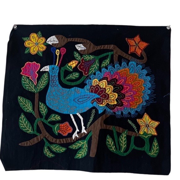 Mexican vibrant peacock textile folk art embroidery in the Otomi/Tenango style