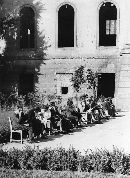 Humboldt University, Students sit in front of the damaged building Old Photo