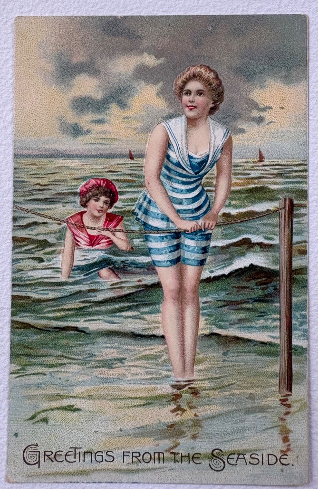 c. 1900 embossed postcard Tuck “Greetings From the Seaside” Women at the Beach