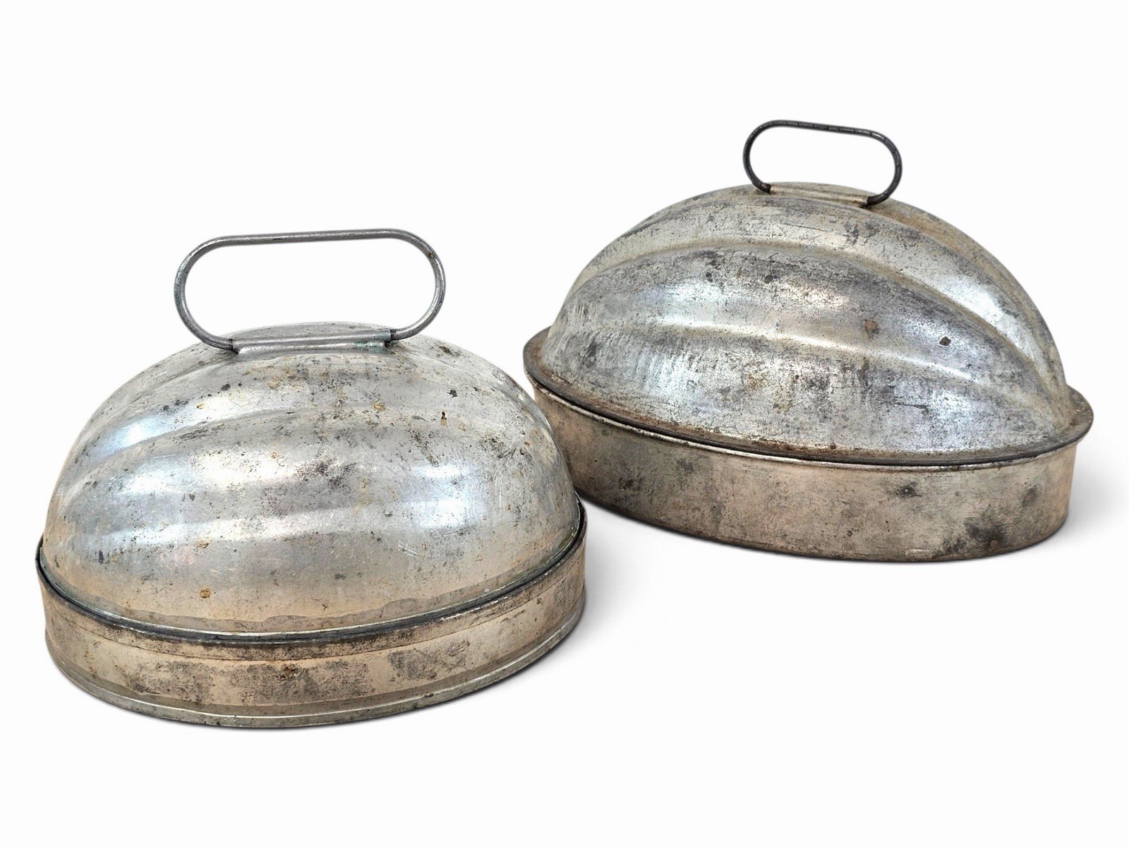 Set If 2 Antique two-piece tin melon-shaped pudding and cake molds