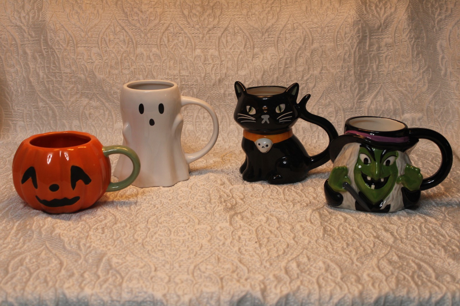 Hyde and Eek Set of 4 Stoneware Mugs Halloween Witch, Ghost, Cat, and Pumpkin.