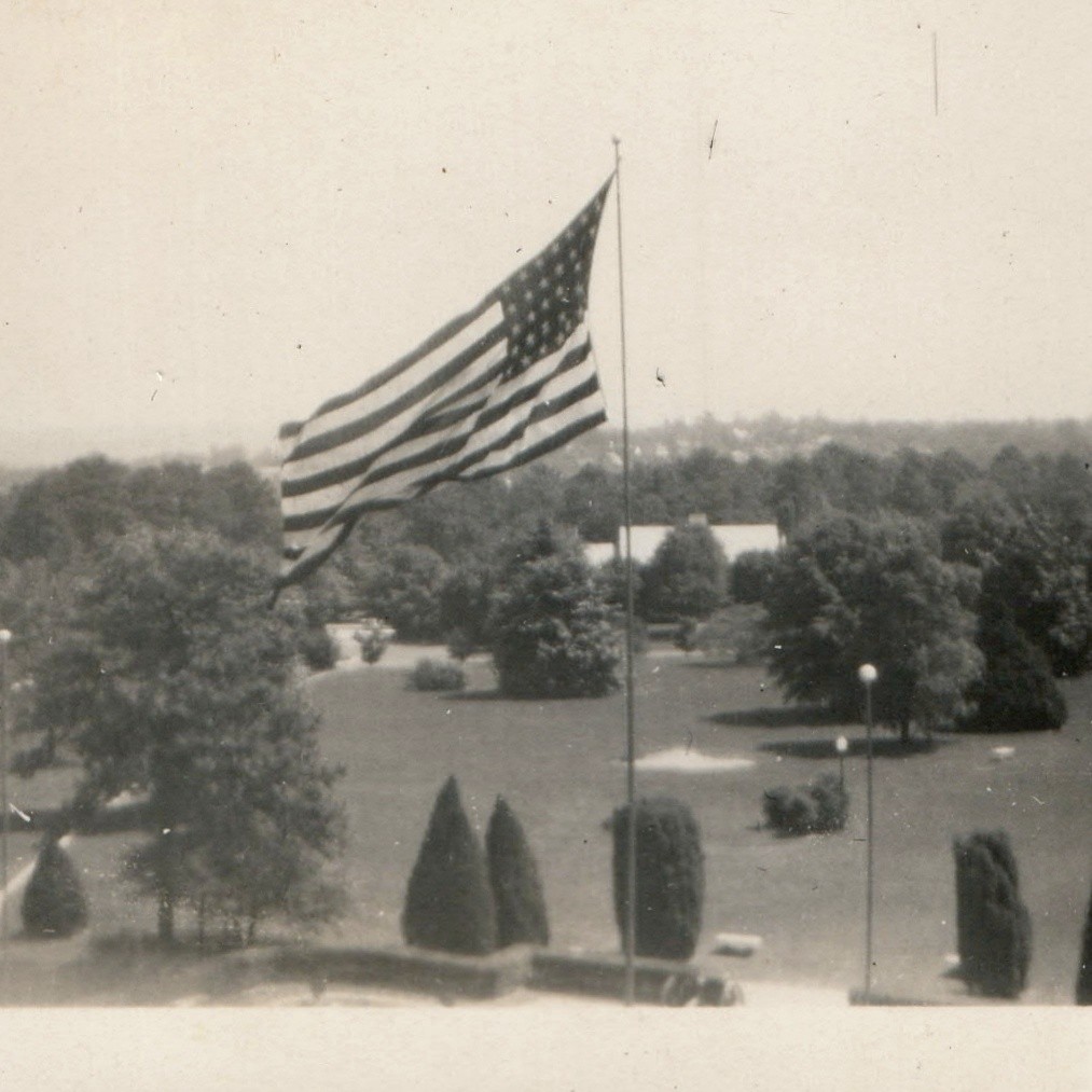 c1940s American Flag Flying High Landscape Trees Snapshot Photo Park Grounds Vtg