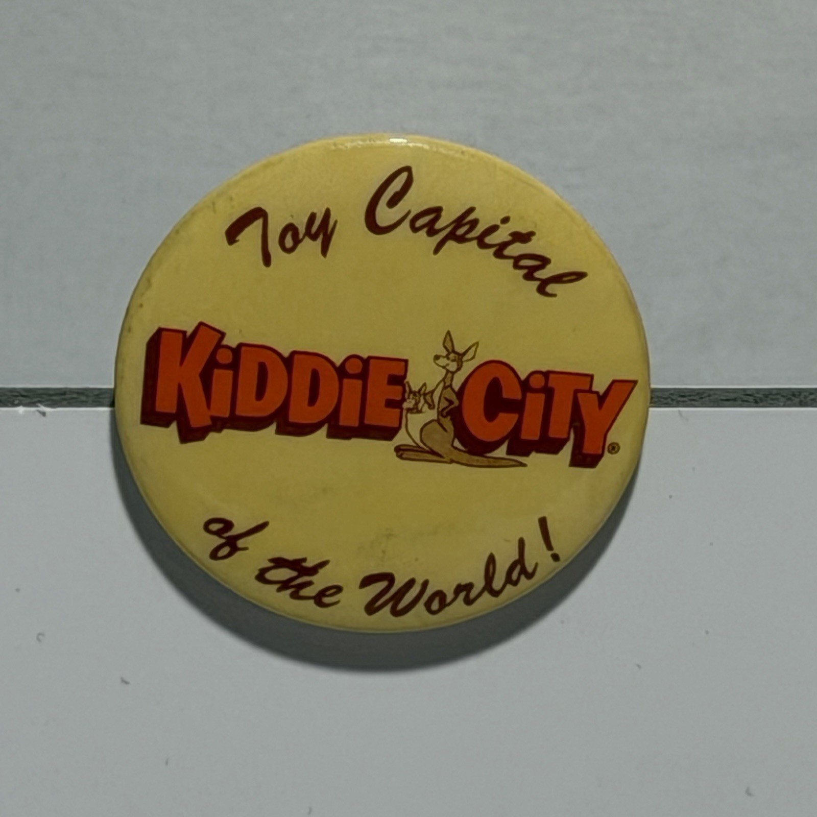 Vintage KIDDIE CITY Toy Capital Of The World Advertising Pin Pinback BUTTON