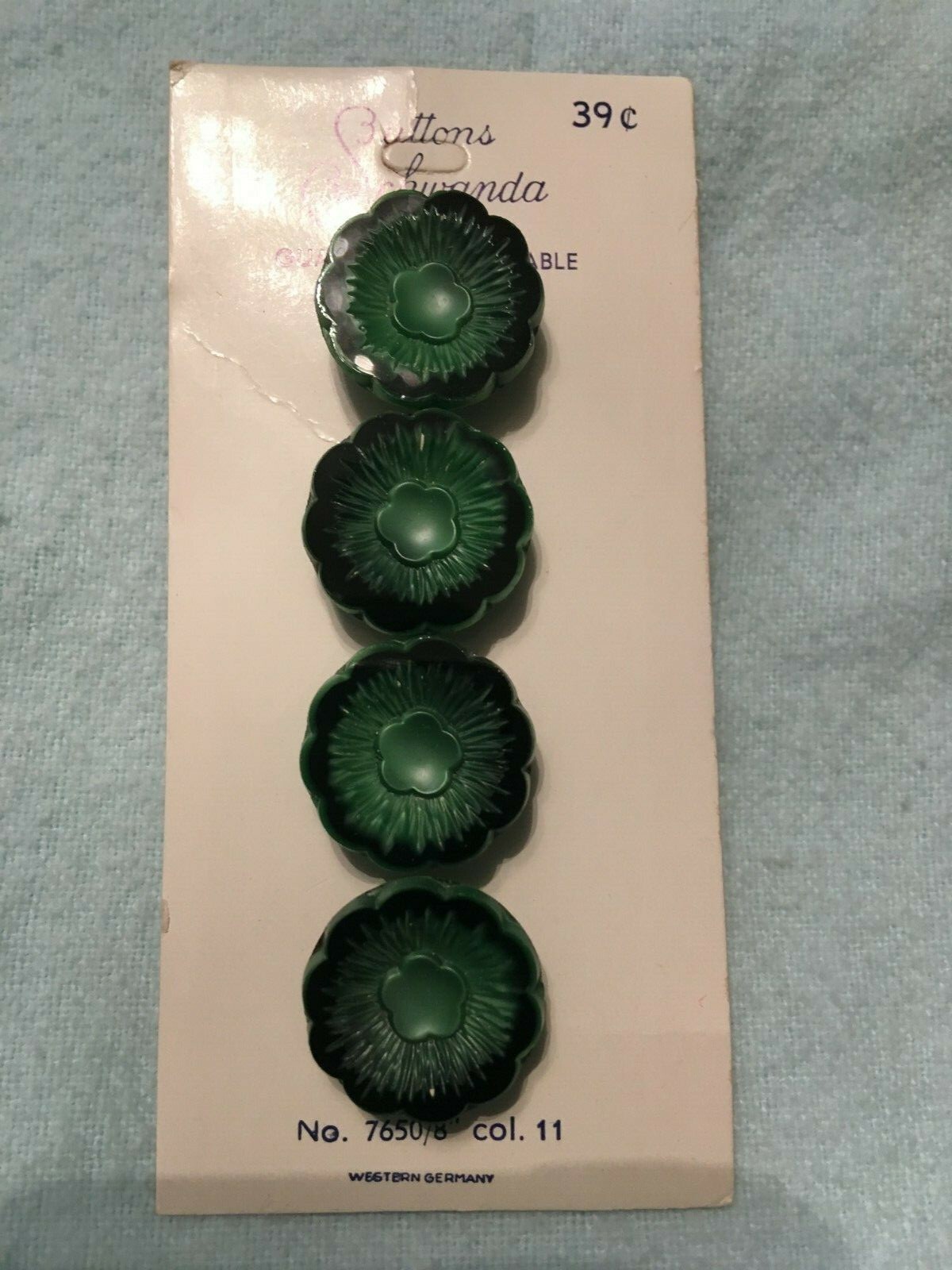 Buttons by Schwanda on original card Green flower 4 glass buttons vintage