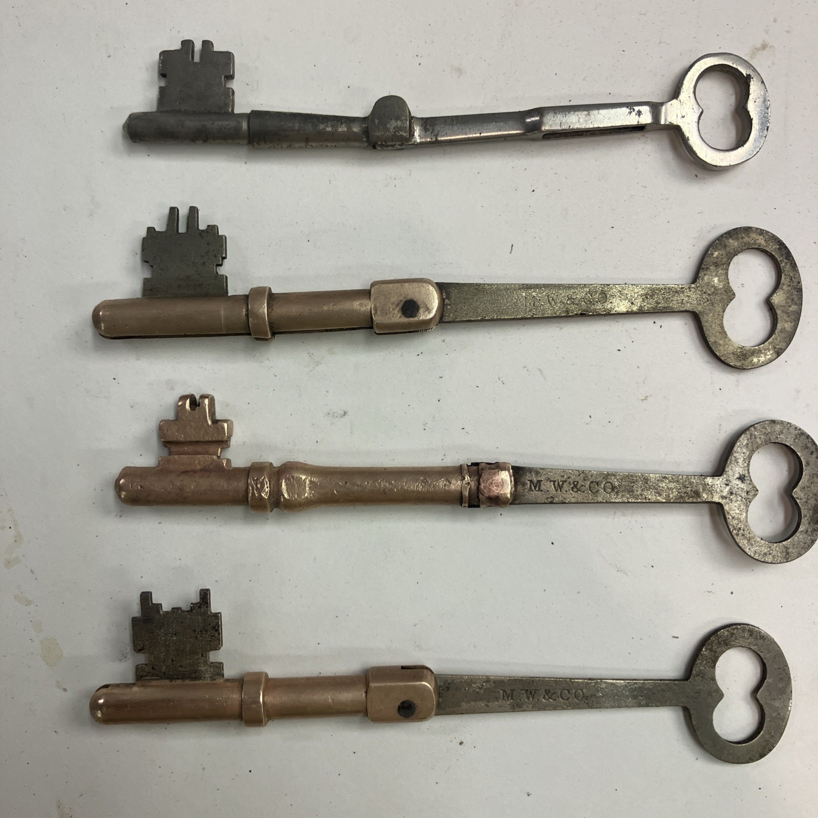 rare antique brass Folding Keys M W & Co 1869