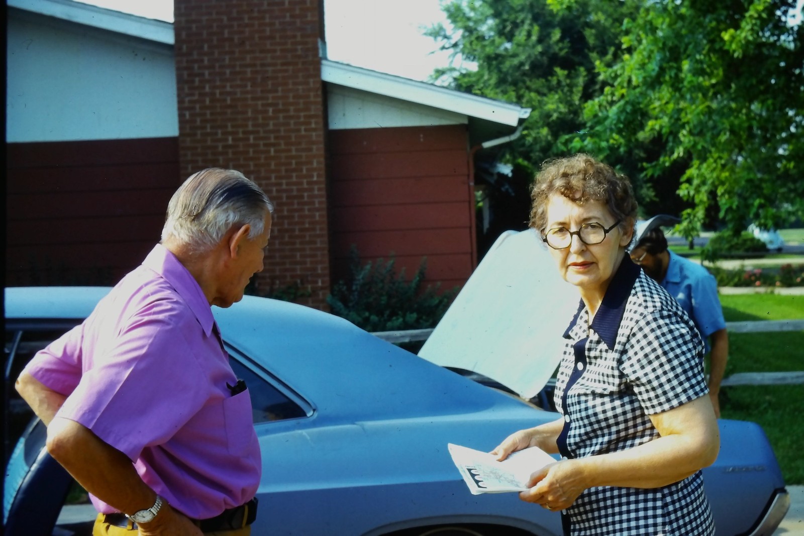 c1970\'s Kodachrome 35mm Slide, Elderly Couple with Blue GM A Body Coupe Car