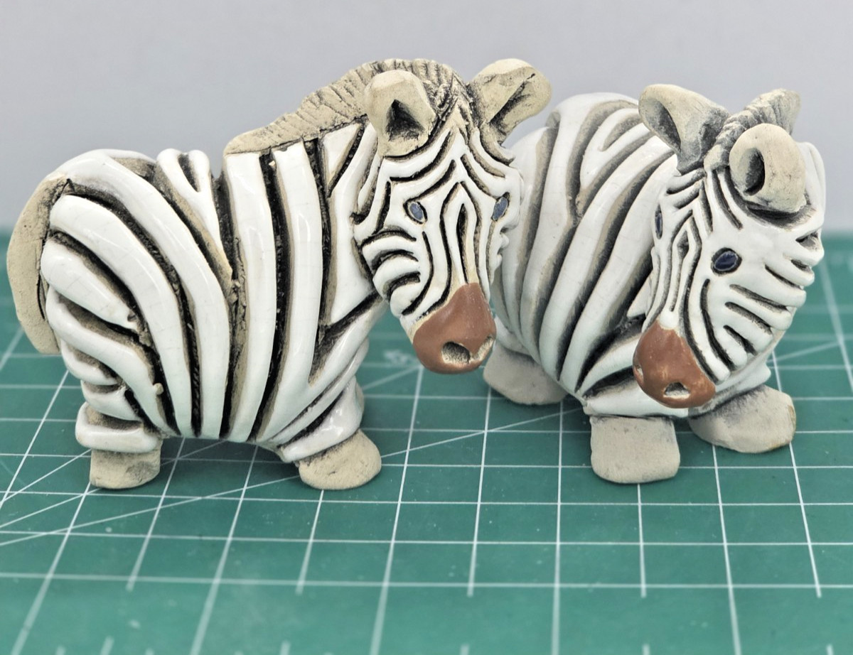 Two Vtg Artisenia Rinconada zebra carved figurines Uruguay signed black/white