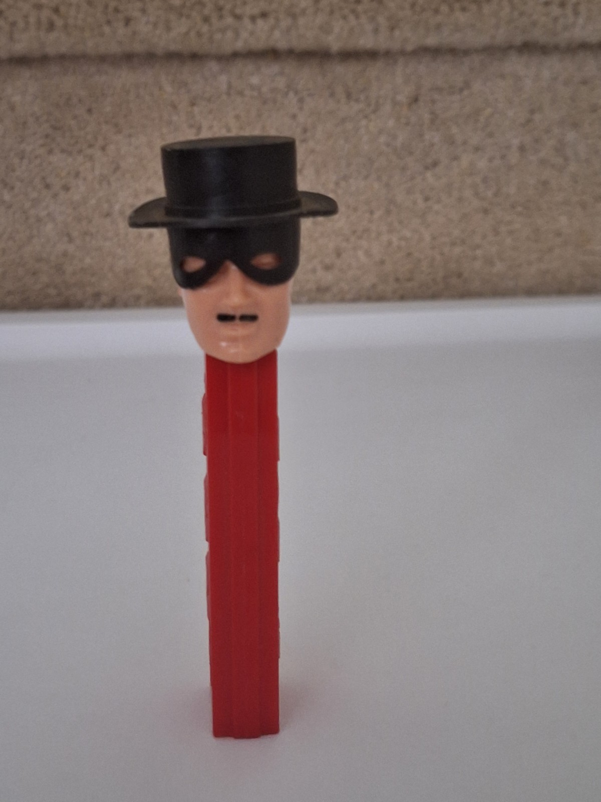 Vintage 1965 No Feet Zorro PEZ Dispenser with Curved  Mask, Red Stem, Austria