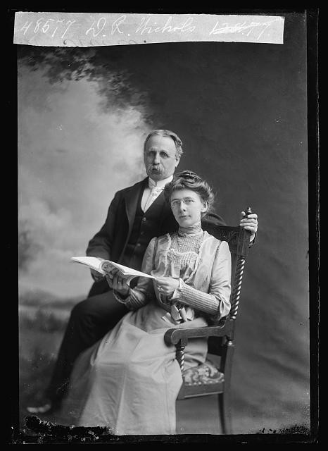 Photo:D.R. Nichols Portrait Man and Woman Reading Book